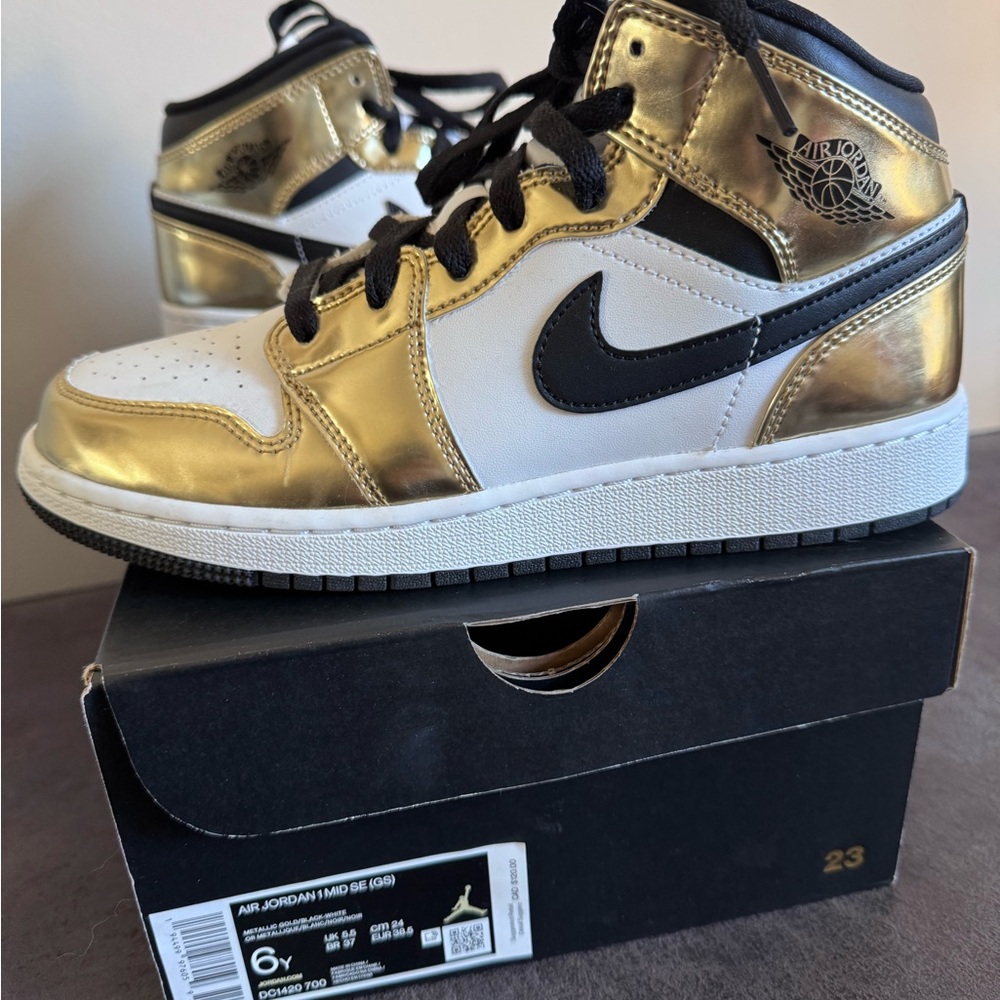 Air Jordan Gold and Black Sneakers